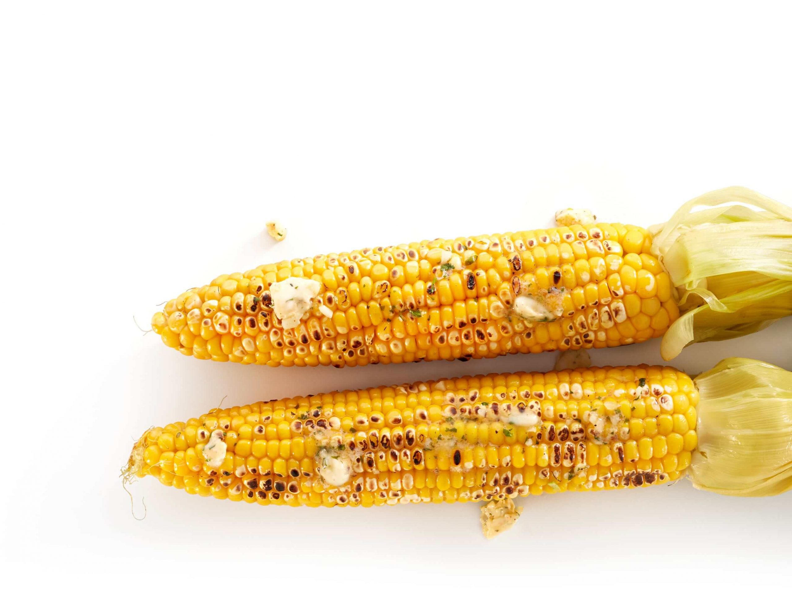 Barbecued corncob with Cilantro butter and Lime